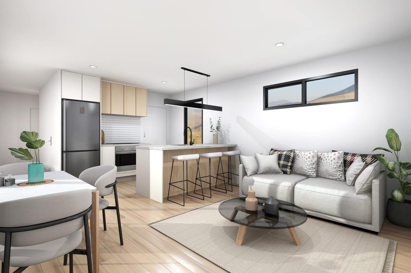 Open-plan living area inside a Paragon Portables two-bedroom portable home with modern kitchen, dining and lounge