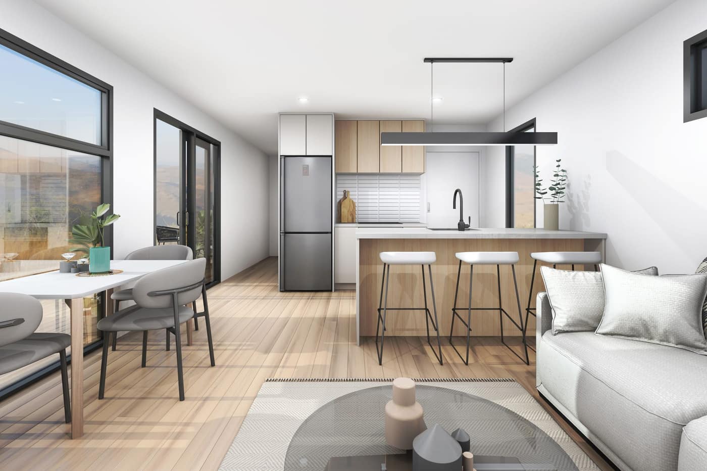 Bright modern kitchen and dining area with natural timber finishes in a Paragon Portables two-bedroom home