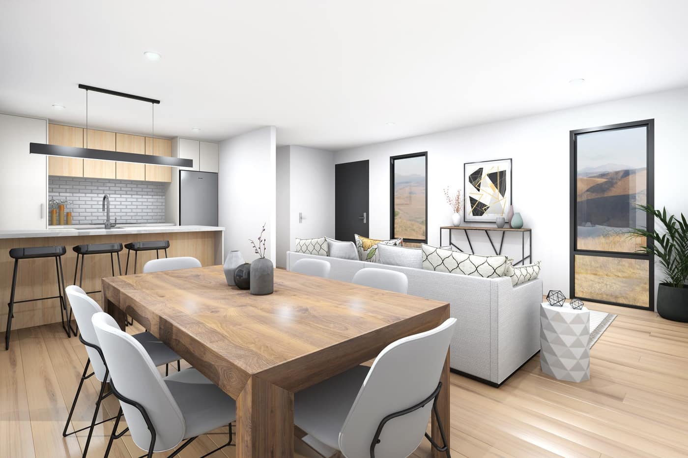 Spacious open-plan kitchen and living area in a Paragon Portables three-bedroom portable home with light timber floors